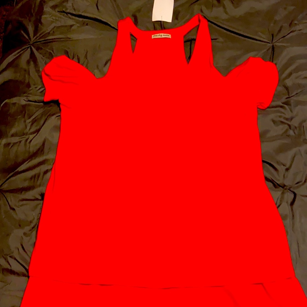 Red shirt with shoulder cutouts